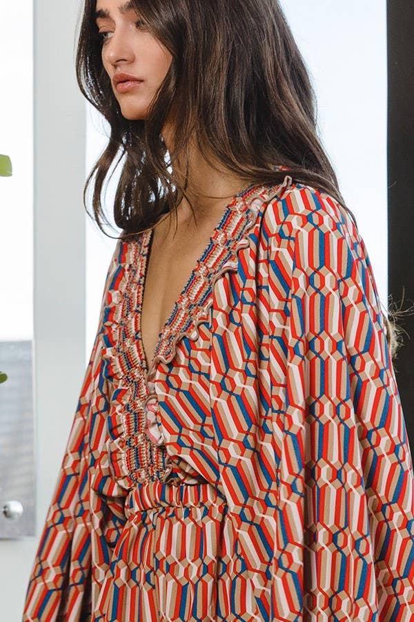 Smocked V-neck Ruffled Geo Printed Woven Romper
