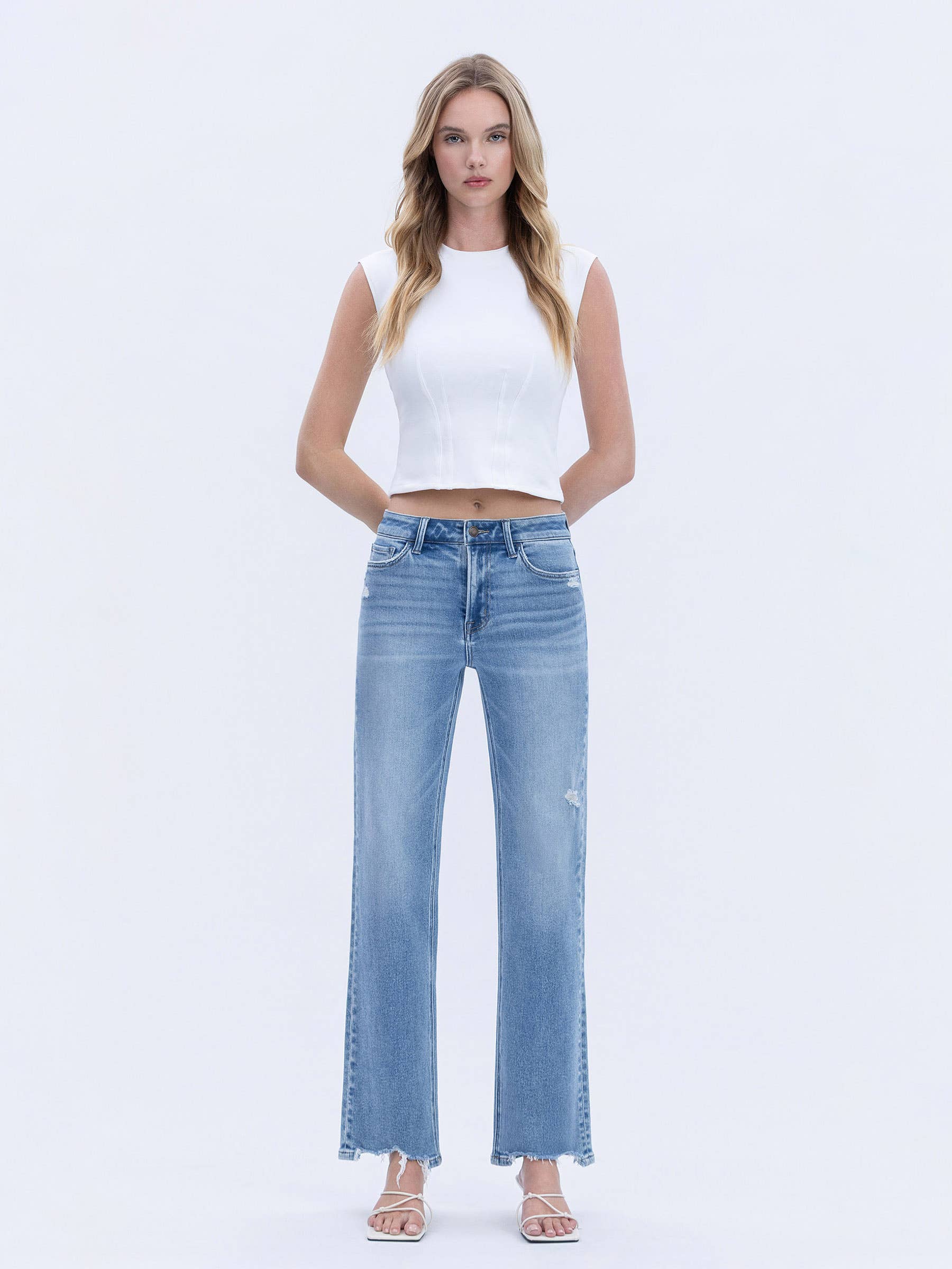 HIGH RISE DISTRESSED HEM SLIM WIDE JEANS