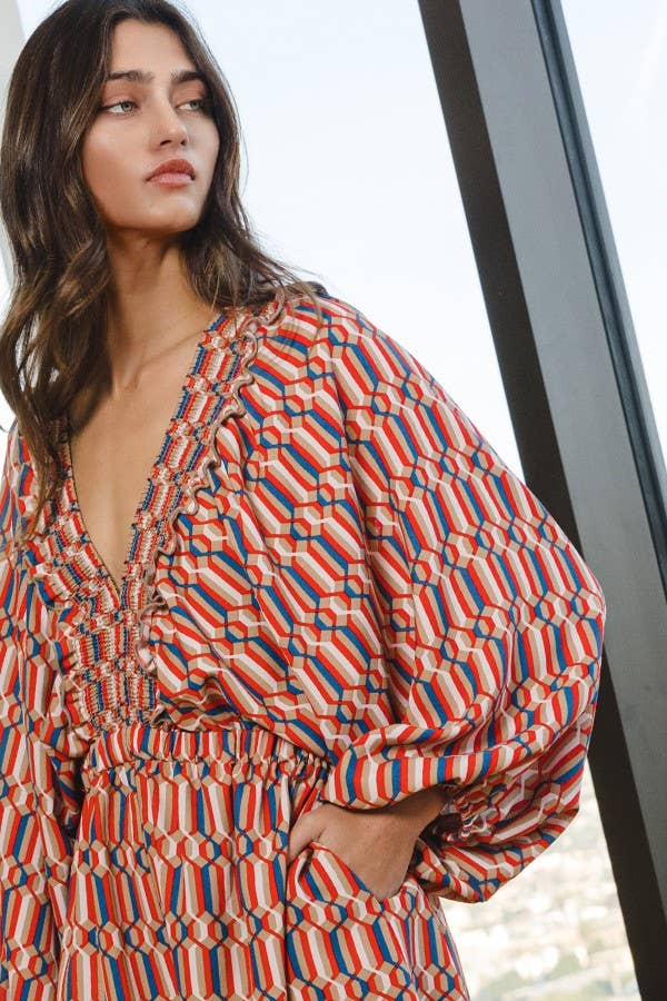 Smocked V-neck Ruffled Geo Printed Woven Romper