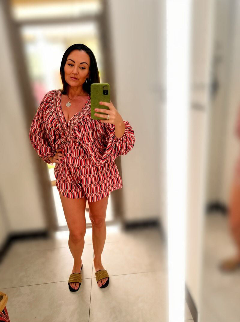Smocked V-neck Ruffled Geo Printed Woven Romper