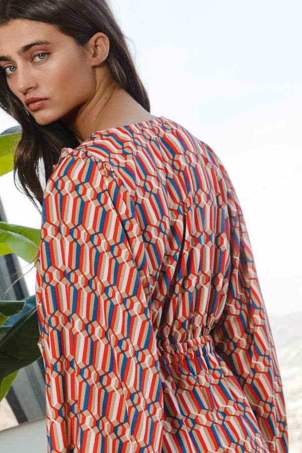 Smocked V-neck Ruffled Geo Printed Woven Romper
