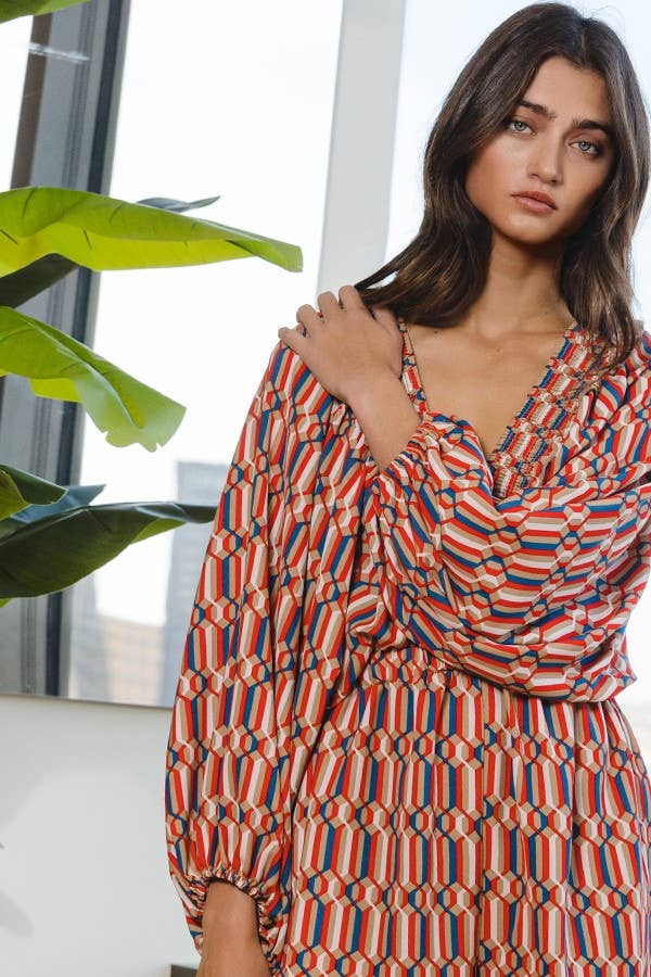 Smocked V-neck Ruffled Geo Printed Woven Romper